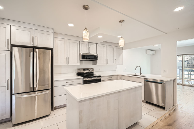 Kitchen - AVAILABLE NOW for Spring 2025!! - newly renovated, quality finishes, open space backyard Townhome