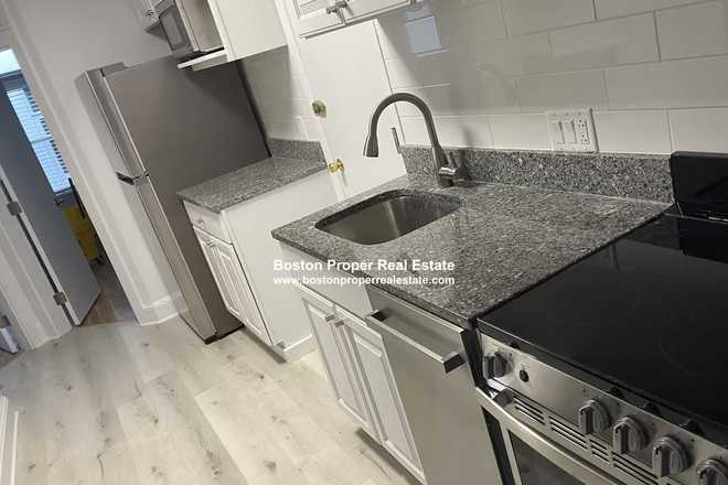 a - TOP FLOOR * RENOVATED * NO BROKER FEE Apartments