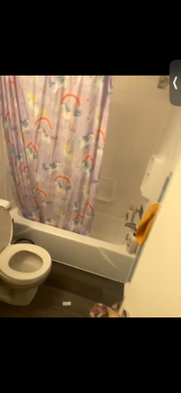 Bathroom with a tub - Parkway Plaza- Cardinal management