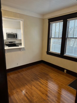 Dining room and pass-thru kitchen window - ★★ 1BR, 900 sq ft (2BR size) ★ TOTALLY remodeled ★ Triplex