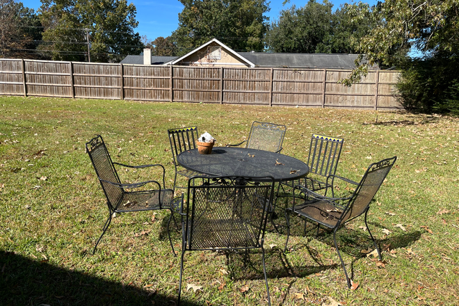 Backyard sitting area - Charming house in West Ashley