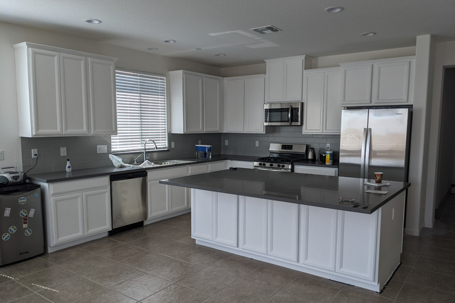 Kitchen - 2 furnished rooms available - 1 with private bath. Kitchen, Laundry, Internet, Utilties Included. House