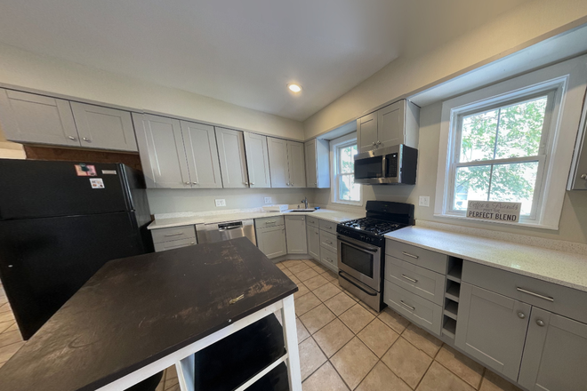 Call NOW for showings! 617-236-8550 - DURHAM ST - LRG & SUNNY FLOOR THRU 3BR/1BA AVAIL *9/1/2026* W/ LNDRY IN BLDNG, PRKNG, DECK, EIK, DW Apartments