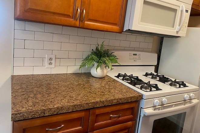Kitchen - Bright sunny 2 BR with parking, laundry and central AIR