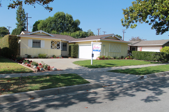 View of the house from the street - Spacious 4BR / 2BA Home Near Chapman University – Lomita Ave