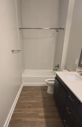 Bathroom, 2 sinks & closet to the right - The Alloy Apartments