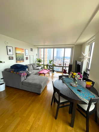 Living Room - Bedroom+private bath available in Beautiful 2 bed/2 bath Downtown Apartments