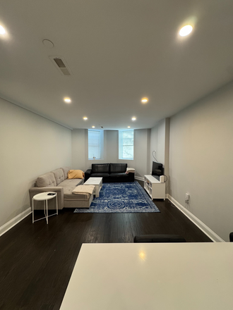living room - Modern Brookline 4 bed with AC and in unit laundry - NO FEE! Apartments