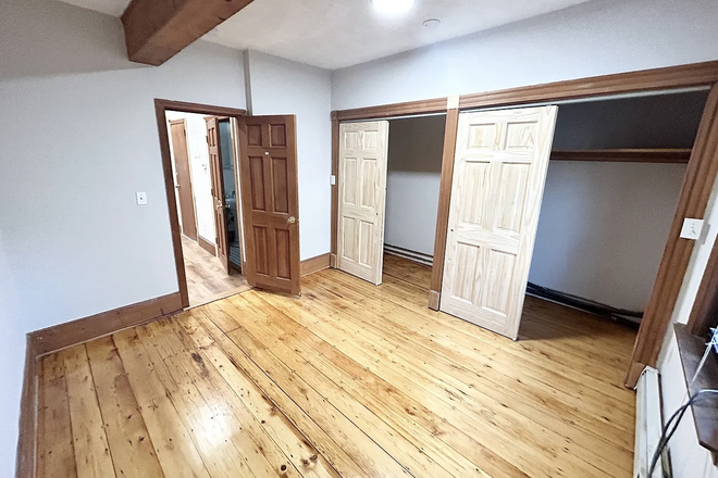 Bedroom (now has bed, rug, lamp, and dresser.) - Sublet in Mission Hill close to campus