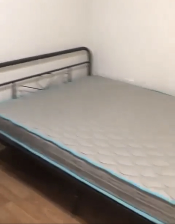 Bedroom, currently it has larger white mattress - University Terrace West Apartments