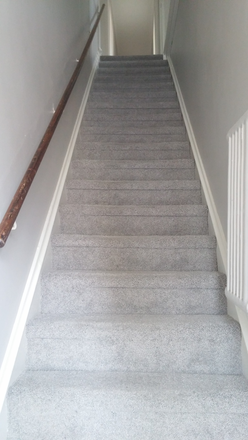 Stairwell leading up to the apartment - ** Large 3 Bedroom Apartment fully Furnished downtown Wayne **