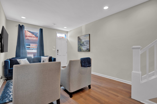 Living room - additional view - Your home away from home, with parking! The JH Shuttle Stops Here!