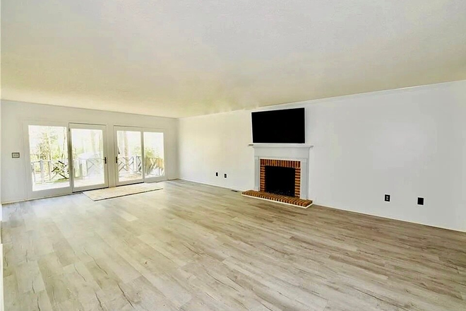 Living Room - True Privacy. Awesome 2 story house in "Camelot"