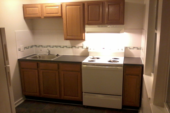 Kitchen - 1 Bedroom apartment with newer Kitchen, Bath,  Heat included, Laundry in bldg, avail 1-Jan--2025