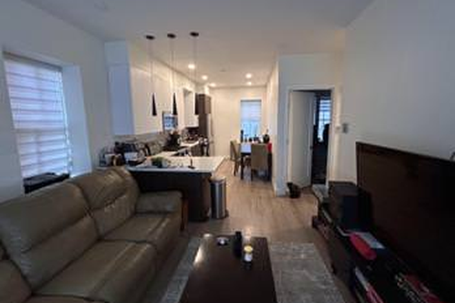 Living room - Private Bedroom available in quiet 4 bed/2 bath