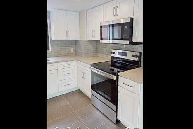 kitchen - NO fee !3bed 2baths, porch, laundry in unit Harvard business Apartments