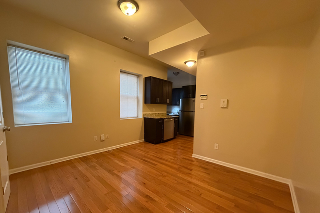 Living/ Dining area - Newly renovated spacious 4 bedroom/ 2 full bath 2nd flr apartment, close to Temple University.