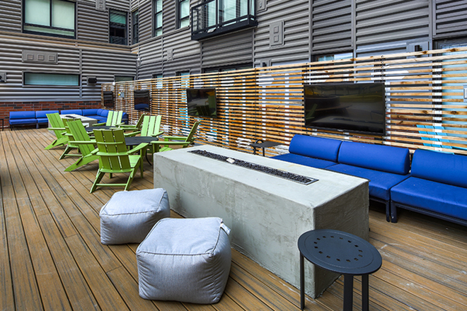 Fire pits and outdoor TVs - Campus Edge on Pierce Apartments