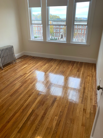 Hub Realty - Brighton, large one bedroom, front facing with enclosed porch Apartments