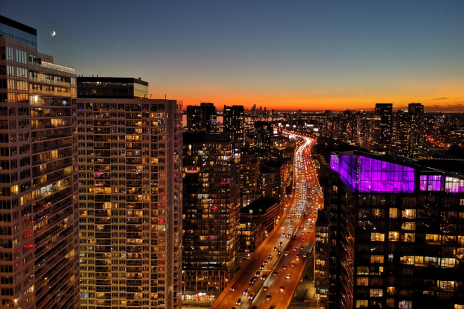 View from the balcony overlooking the Gardiner - Large furnished studio on the 43rd floor near Harbourfront and close to Union Station Condo