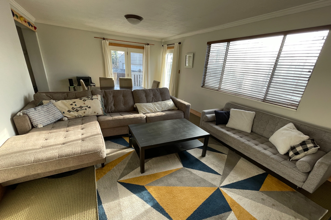 Living Room - Private Room Available | Less than 500 ft from bus stop to the U