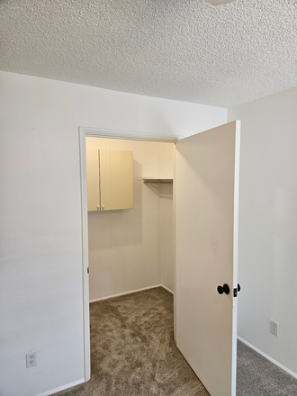 Bedroom Closet - 2 Bedroom, Updates with new flooring and doors.  Quiet West facing Condo