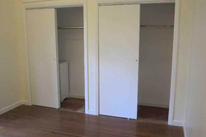 Double closets, third closet above - Room in our home.