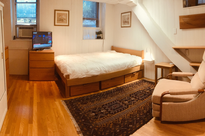 Full size bed with underbed storage drawers - WALK TO HARVARD. Furnished 1-Bedroom garden studio, in-unit laundry, heat + all utilities. Apartments