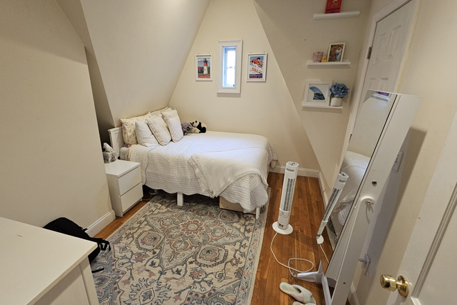 Spacious bedroom #1 with built-in shelves, hardwood floors, plenty of storage/ room for furniture - Awesome 6 bed/ 2.5 bath Available 2027- Prime Location!! Duplex