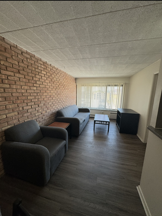 Living room - Cedar Village Apartments