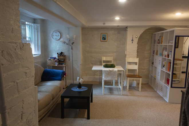 living room and dining area - Potomac House of Georgetown - Renovated Studio Apartment available January 2026