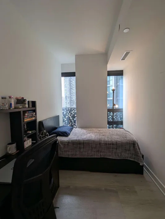 Bedroom - 1 Furnished Bedroom in 3 Bedroom High Rise Condo Unit