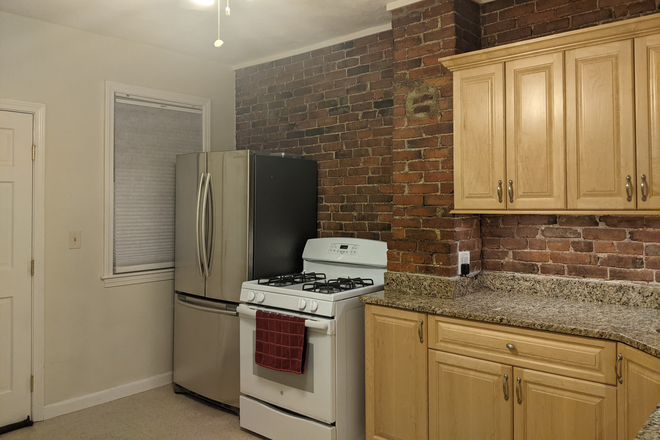 Kitchen - Delightful 2 bedroom condo! In unit washer dryer, dishwasher, yard, storage, and more!