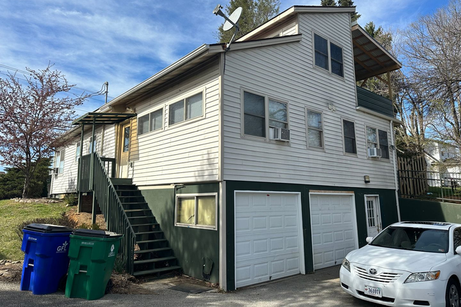 Photo - Unique 4 Bedroom with 2 Car Garage and outdoor Entertainment Space - Rent TBD House