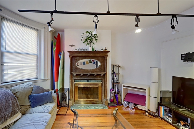 Living Area - South End 3 Bed across from Campus!! Condo