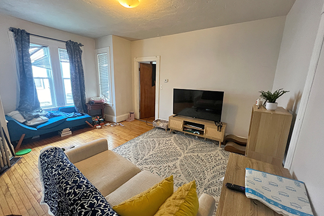 living room - 737 Sq Ft 1 Bed W/ Parking Available September 1st! Triplex