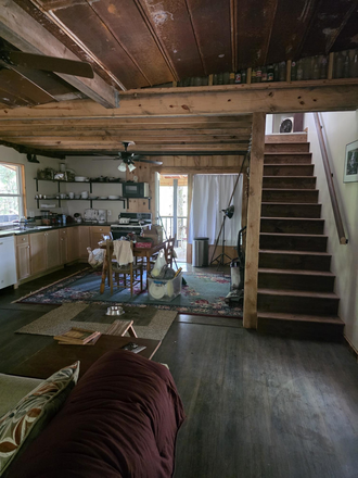 Kitchen open to Living area,  door to outside deck - Mountain cabin near the Appalachian Trail Blood Mountains and Turners Corners House