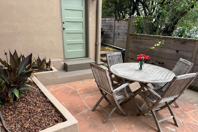 Outside patio - Hillside bay view 1 bedroom apartment