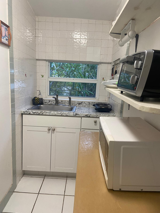 Kitchen - Furnished Private Studio – Quiet, Cozy & Bike‑Friendly (UM Students Only) House