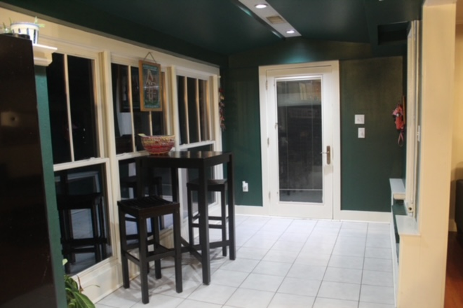 Second angle of front door and sunroom area - One female roommate needed for a 3 bedroom, 2 bathroom home close to LSU campus