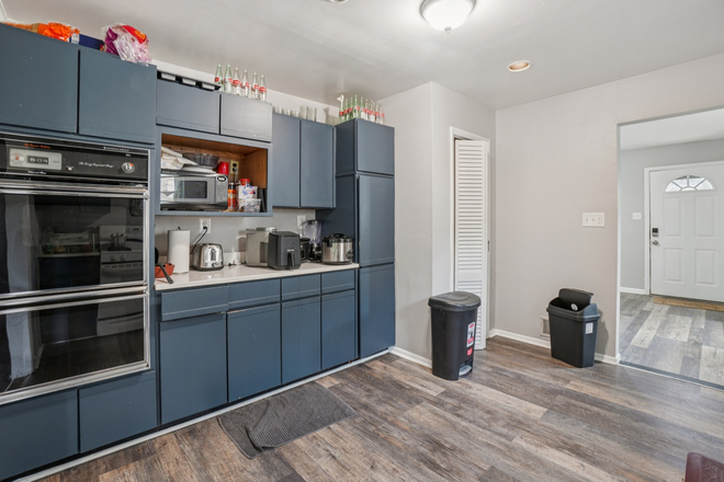 main floor kitchen - Room in house walking distance to campus.