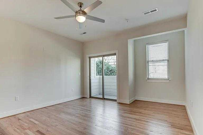 Living room (Downstairs) - Monroe Properties Apartments