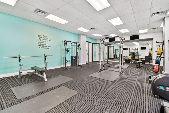 Fitness Center - Open 24 hours - Malibu Apartments | Close to Campus!