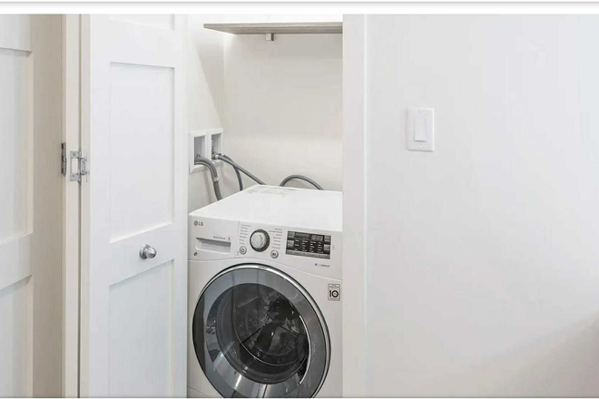 A washer-dryer combo unit - Nova Quincy Apartment Complex, Walking distance from Red Line