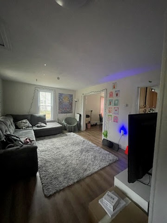 Living Room again, some furniture available. - CUTE HOUSE in OLD TOWN.  PARK HERE, WALK TO CLASS AND METRO. QUIET NEIGHBORHOOD, PRETTY YARD.