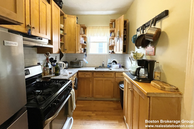 kitchen - Mission Hill 3 Bedroom - Stainless Steel, Granite, Hardwood Apartments