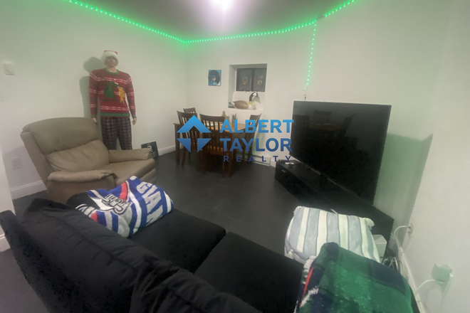 Living Room - $1500/Room ACROSS from ISEC!! Apartments