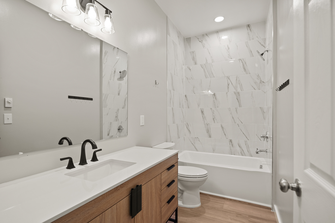 bathroom with tiled shower tub - PENTHOUSE 3B2B  - BRAND NEW HUGE MODERN APT near campus