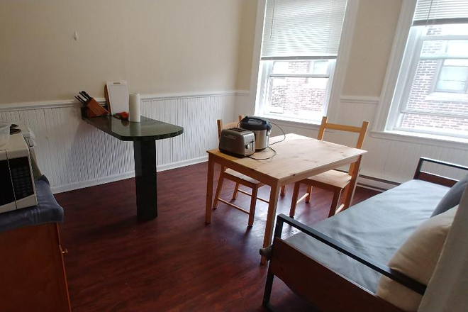 Visit hubrealtyproperties.com - Handy 2 bedroom with newly updated kitchen and breakfast bar, on the green line T