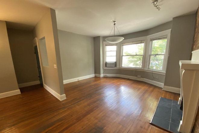 Living room - AUGUST 2026- Walk to UC campus from this studio!